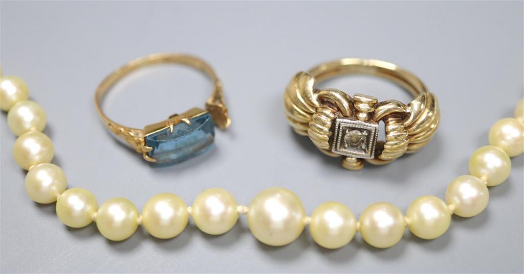 An early 20th? century yellow metal and diamond set ring, gross 7 grams, and 18k ring (a.f.) gross 1.9 grams and a necklace.